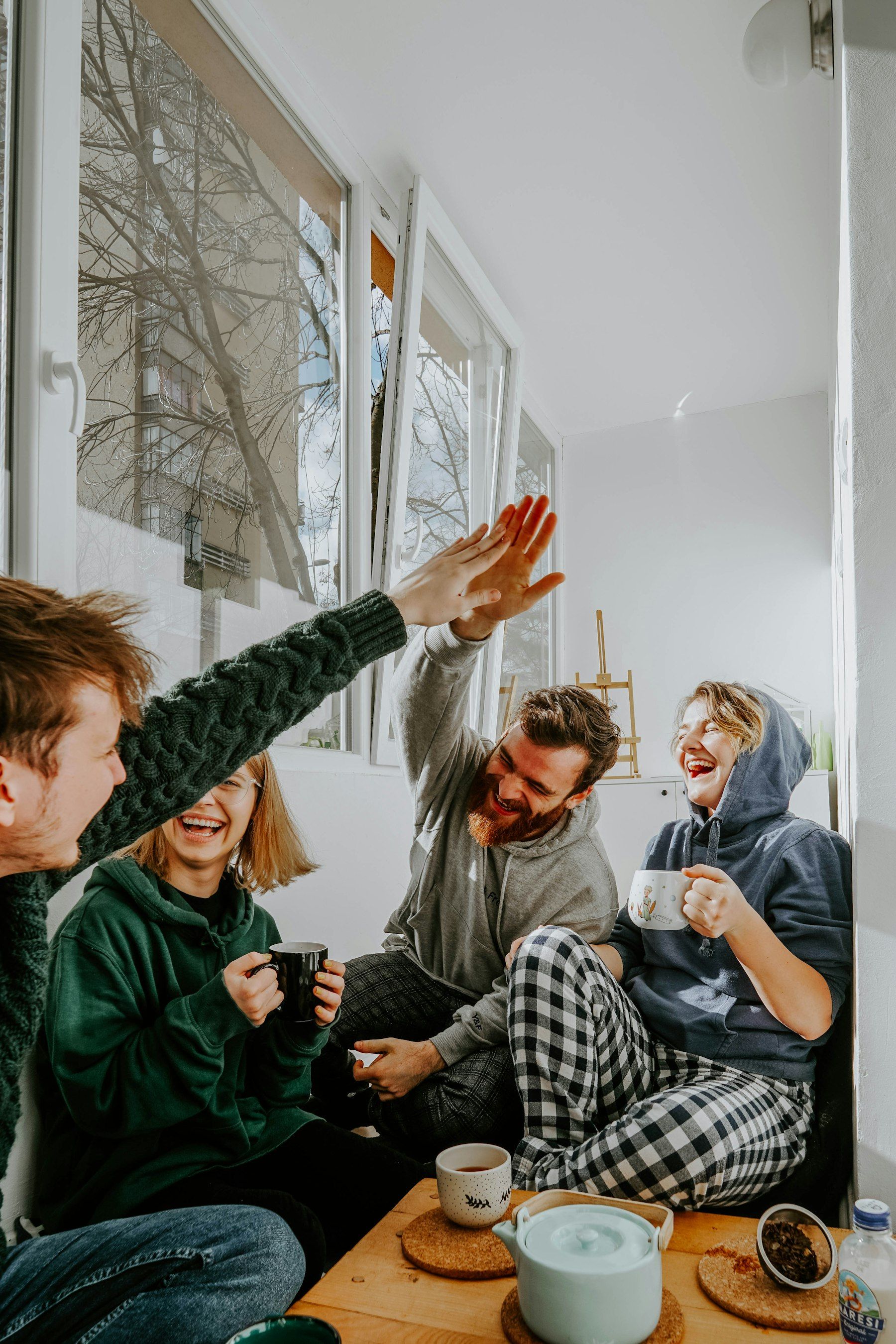 Friends sharing coffee and laughs