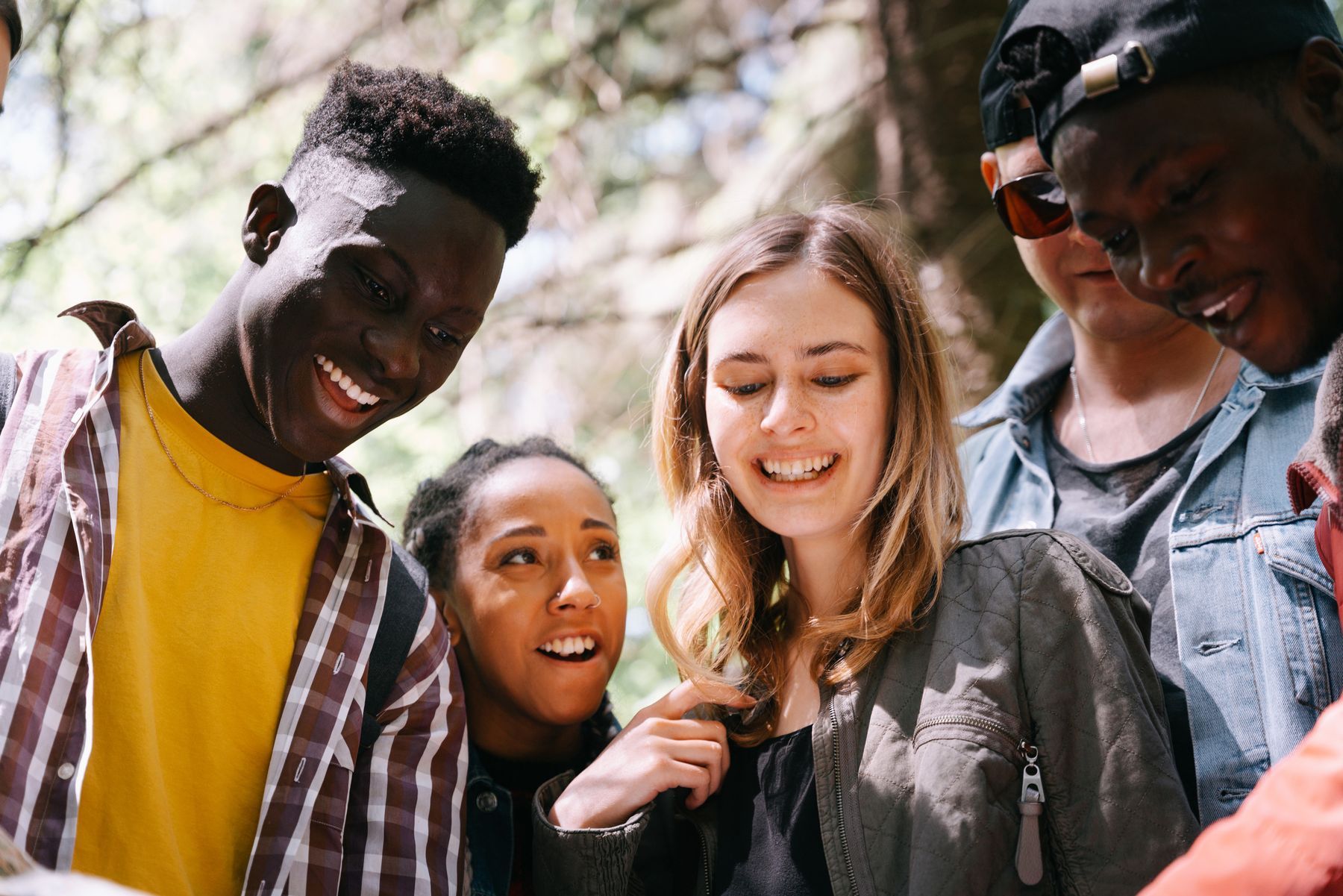 Friends laughing together outdoors